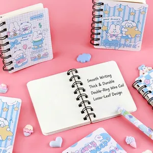 Cute cartoon sheep and rabbit themed spiral notebooks and matching pen set on pink background