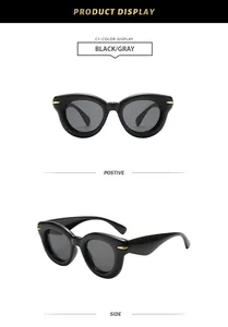 Close-up front and side view of premium round thick-frame sunglasses in black and gray.