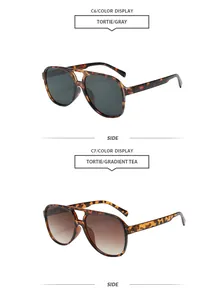 Détail de lunettes de soleil aviateur rétro en écaille avec verres gris et dégradés thé.