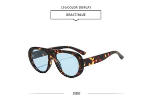 Detailed side view of classic tortoise shell aviator sunglasses with blue lenses for women