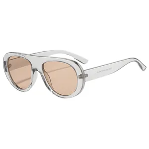 Oversized transparent aviator sunglasses with stylish retro orange lenses for women