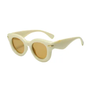 Stylish round thick frame bubble sunglasses with cream frame and amber lenses