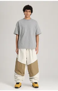 Vorderansicht der modischen Herren-Skihose mit Patchwork-Muster in Beige und Khaki