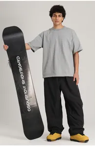 Pantalones de snowboard negros de corte ancho resistentes al viento e impermeables