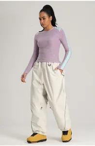 Pantalones de esquí holgados en blanco roto impermeables y cortavientos para invierno