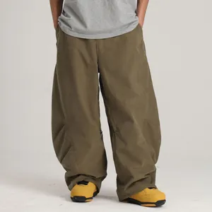 Pantalones de esquí verde oliva oversize en tejido funcional impermeable y cortavientos
