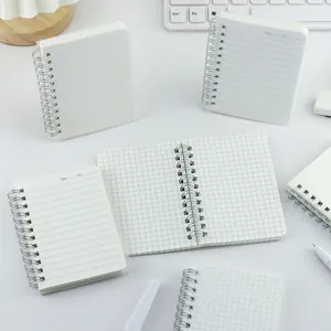 Portable mini spiral notebook with PP frosted transparent cover and grid or lined pages.
