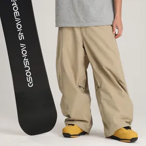 Pantalones de esquí beige holgados de pierna ancha con diseño cargo impermeable