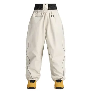 Pantalones de esquí profesionales crema cortavientos e impermeables de invierno