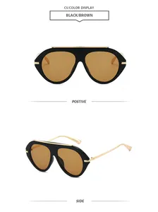 Front and side views of oversized black and gold aviator sunglasses with brown lenses