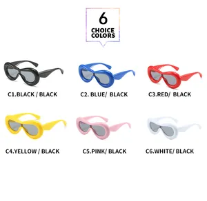 Selection of six chunky avant-garde sunglasses in various vibrant candy colors.