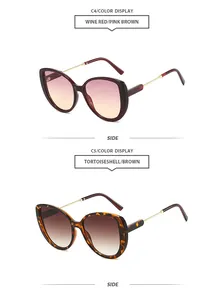 Detailed side view of trendy oversized sunglasses in wine red and classic tortoiseshell