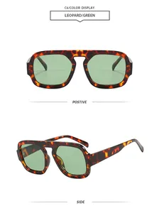 Macro detail showing leopard print frame and green lenses of retro pilot sunglasses