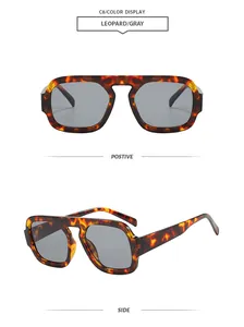 Detail view of retro leopard print aviator sunglasses with gray lenses