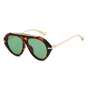 Stylish aviator sunglasses featuring tortoiseshell frames and green lenses for fashion