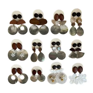 Assorted set of vintage wooden and natural shell drop earrings with bohemian geometric designs