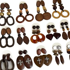 Diverse collection of vintage style wooden drop earrings featuring various geometric shapes