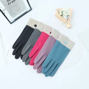 Detailed view of colorful ladies' thermal touchscreen gloves with white line accents.