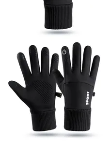 Detail showing black winter outdoor sports gloves with touch screen fingertips and grip