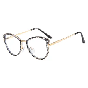 Stylish retro tortoiseshell cat-eye glasses with gold temples and anti-blue light lenses.