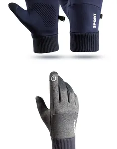 Close-up detail of winter outdoor gloves with touchscreen fingertips and knit cuffs