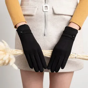 Elegant black velvet touchscreen winter gloves for women featuring button cuff detail