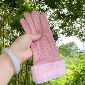 Women's warm winter pink suede gloves with plush cuffs, thick lining for cold weather.