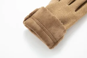 Detailed view showing the soft plush texture of brown thermal winter gloves for women
