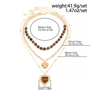 Detailweergave van gelaagde vintage tijgeroog hart hanger ketting met afmetingen