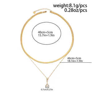 Dimensioni della collana a strati dorata: lunghezze 40 e 46 cm, 8,1 g, pendente a goccia.