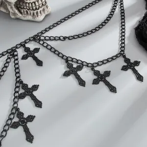 Detailed close-up view of a Gothic black body chain featuring ornate cross pendants.