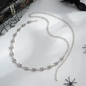 Detailed view of silver spider-themed waist chain with intricate gothic hip-hop design