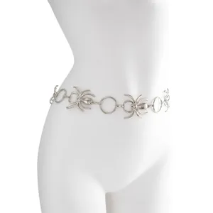 Silver spider waist chain belt with geometric circle links on white mannequin