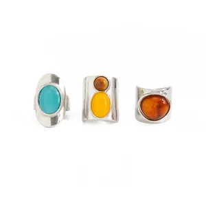 Set of vintage wide band rings with colorful resin gemstones in polished silver finish