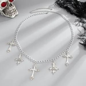 Gothic style silver body chain featuring ornate cross pendants for punk aesthetics