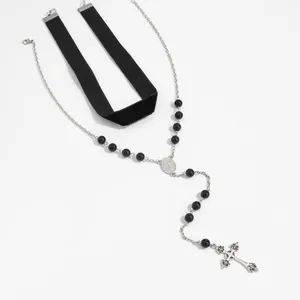 Gothic cross pendant necklace set with black velvet choker for Halloween fashion jewelry.