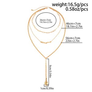 Vue détaillée du collier en Y doré multicouche avec pendentif goutte et ses dimensions
