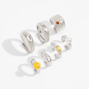 Geassorteerde set verzilverde open teenringen met gekleurde zirkoniasteen