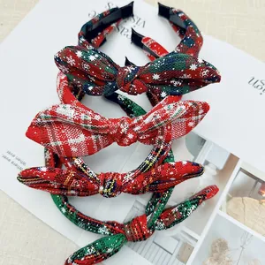 Festive Christmas bow headband set featuring classic red plaid and snowflake patterns