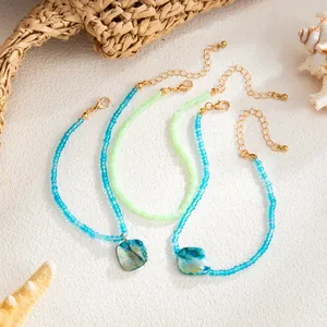 Bohemian beach anklet set with colorful seed beads and blue polished shell pendants