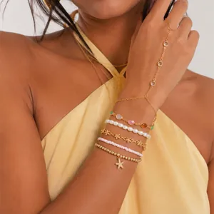 Conjunto de pulseras de estrella de mar y perlas doradas con cadena de mano de cristal