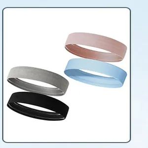 Detailed view showing four colors of elastic sports headbands for running and yoga