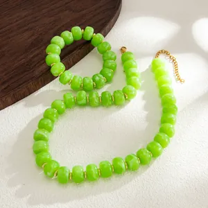 Detail of marbled lime green resin beads on bohemian necklace and bracelet jewelry set
