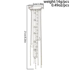 Detail view of silver star chain safety pin brooch showing 21cm length measurement