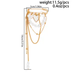 Detailed view showing precise measurements of a layered chain brooch with heart and pearls