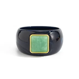 Retro marbled chunky resin bangle with a green square stone and gold-tone frame
