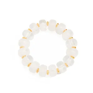 Detail view of bohemian resin beaded necklace featuring gold stainless steel spacers