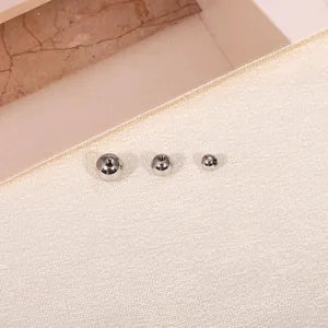 Three polished stainless steel internally threaded piercing replacement balls in various sizes