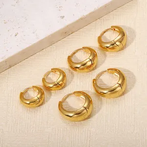 Vintage gouden dikke creolen van titaniumstaal met minimalistisch waterdruppelontwerp