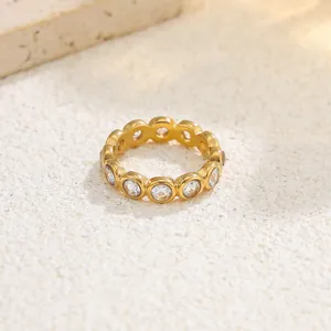 Detailed view of 18K gold-plated stainless steel ring with micro-pave zirconia stones